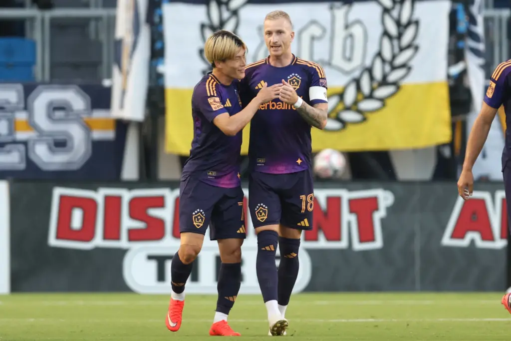 Galaxy forward Kyogo Furuhashi, left, congratulates midfielder Marco Reus (18)...