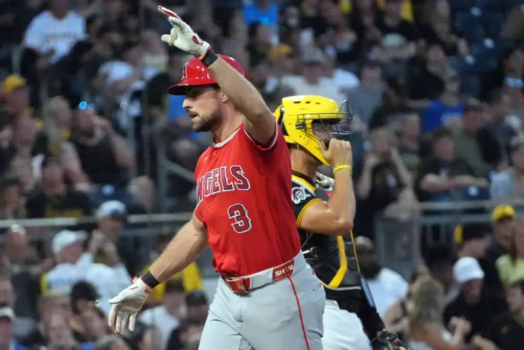 Angels’ Josh Lowe (3) celebrates on his way back to...