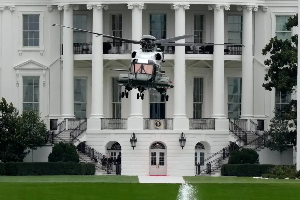 Marine One lifts off from the South Lawn of the...