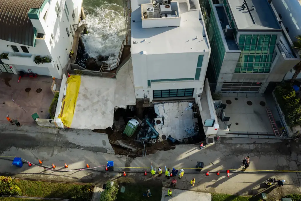 An aerial view of a sinkhole which collapsed the driveway...