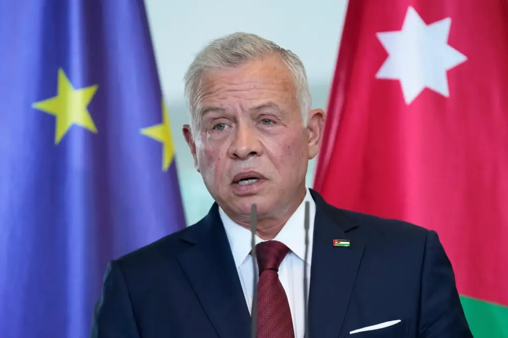 Jordan's King Abdullah II attends a news conference.