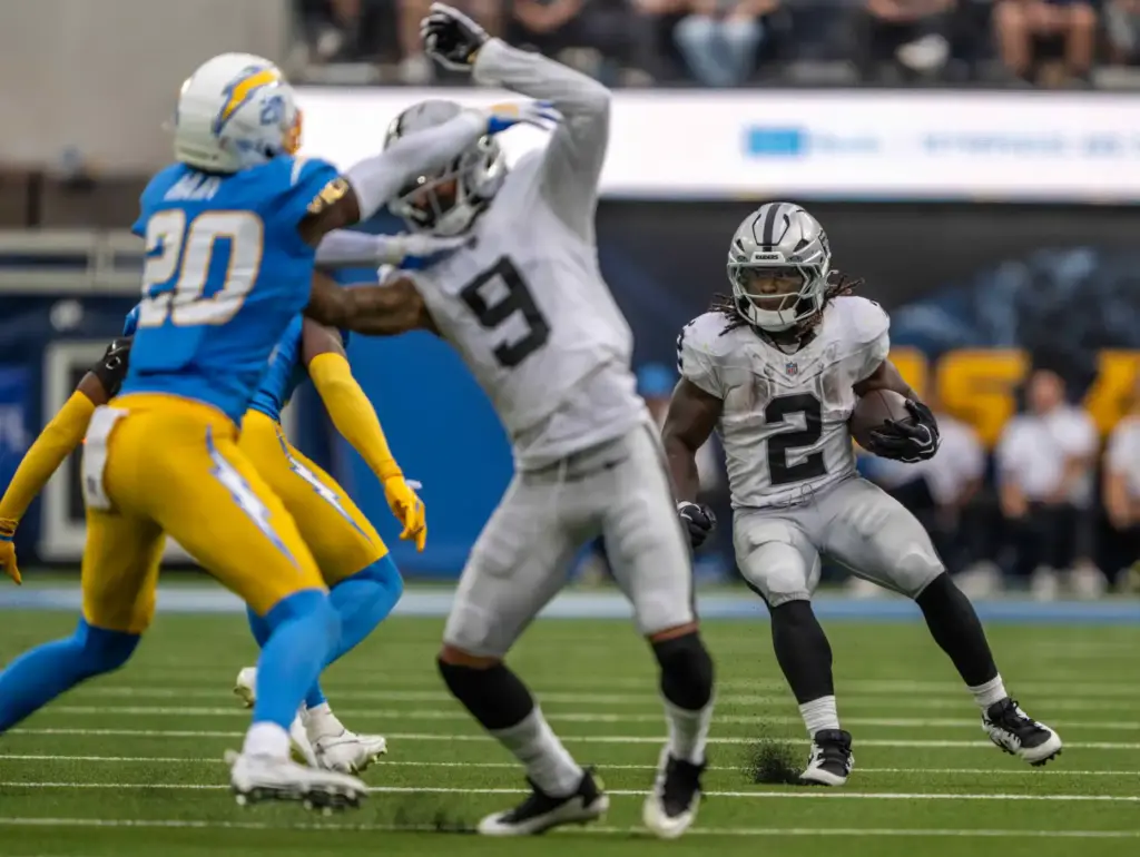 Las Vegas Raiders running back Ashton Jeanty (2) carries the...