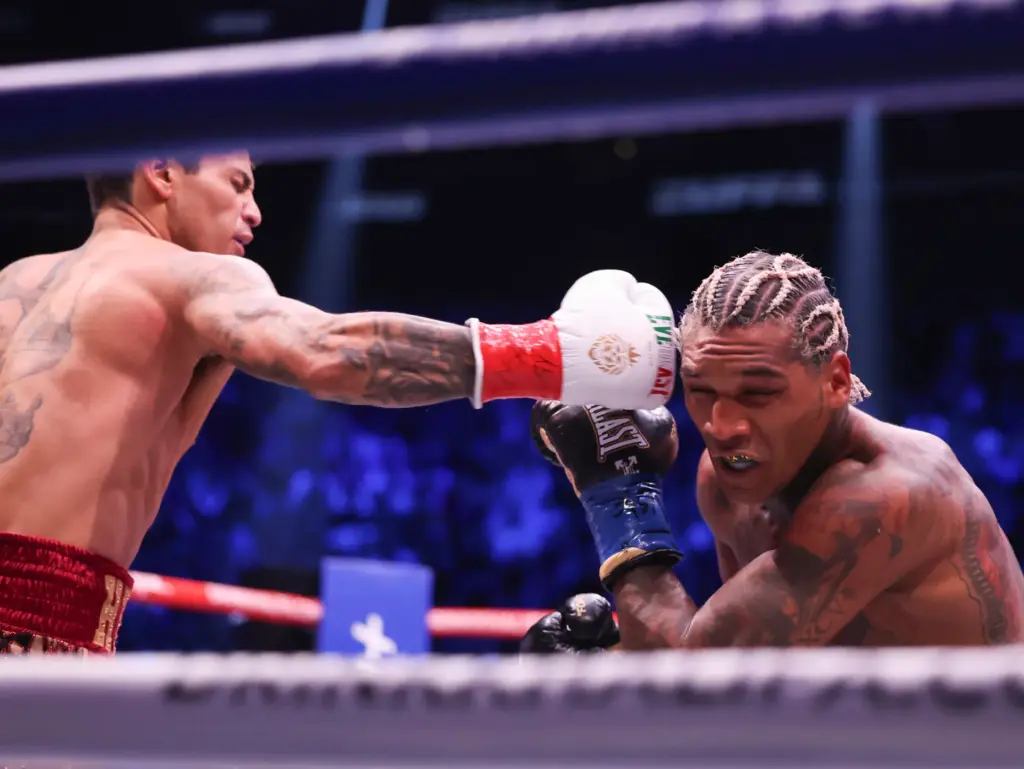 Ryan Garcia, left, punches Conor Benn in their welterweight championship...