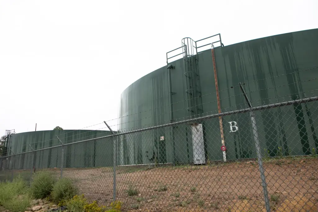 Reserve water tanks for holding drinking water for Grand Canyon Village stand behind fencing.