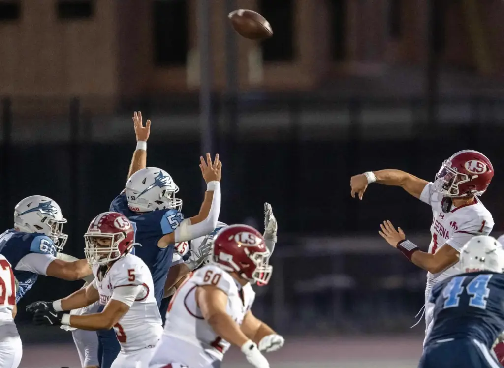 La Serna quarterback Grady Long (1) throws the ball during...