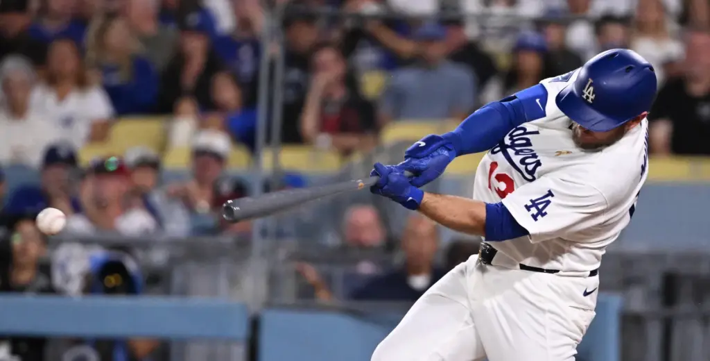 Dodgers third baseman Max Muncy doubles against the Washington Nationals...