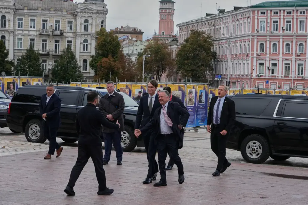 Ukraine’s President Volodymyr Zelenskyy, left, greets U.S. President Donald Trump’s...