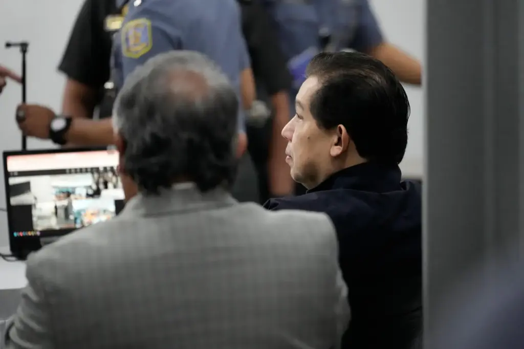 Philippines former House Speaker Martin Romualdez waits for the start of his arraignment.