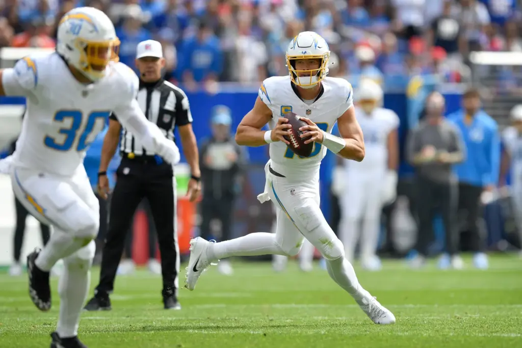 Chargers quarterback Justin Herbert looks to pass during the first...