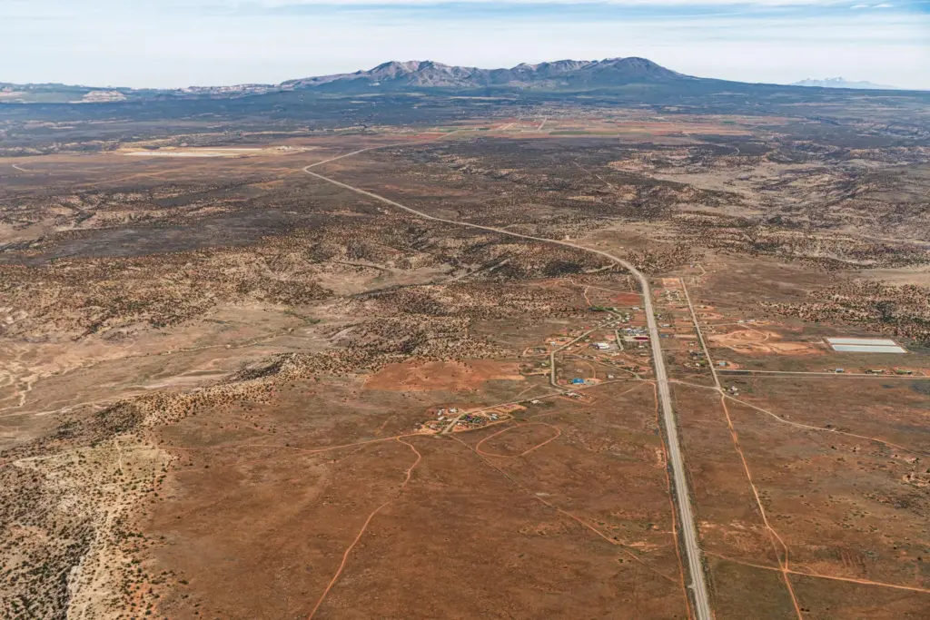 Federal highway 191 brings trucks carrying uranium ore through the White Mesa community.
