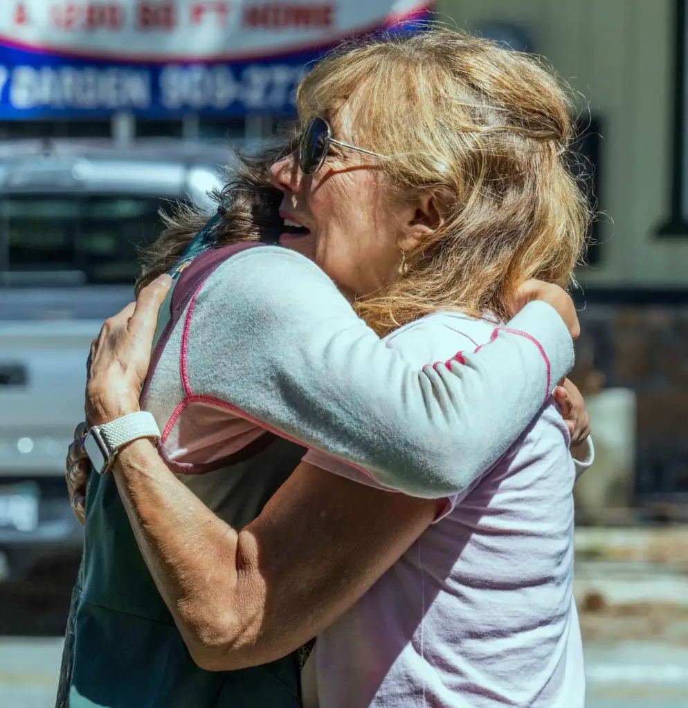 The unveiling was emotional for some visitors, who hugged after...