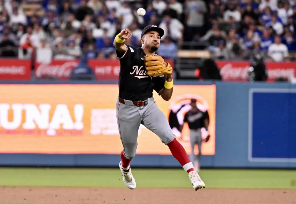 Washington Nationals shortstop Nasim Nunez throws out the Dodgersâ Mookie...