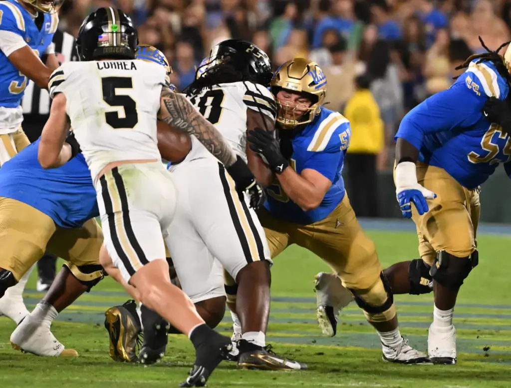 Offensive lineman Riley Robell (51) of the UCLA Bruins against...