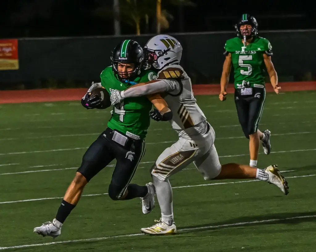 South Torrance running back Nathan Kerekes runs with the ball...