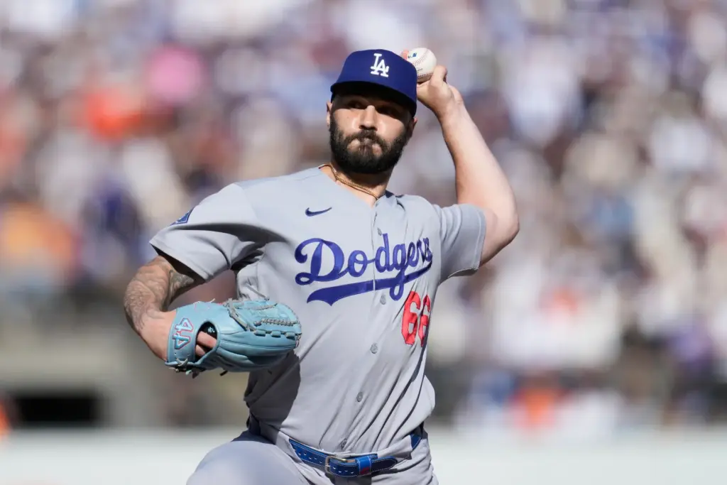 Dodgers pitcher Tanner Scott throws against the San Francisco Giants...