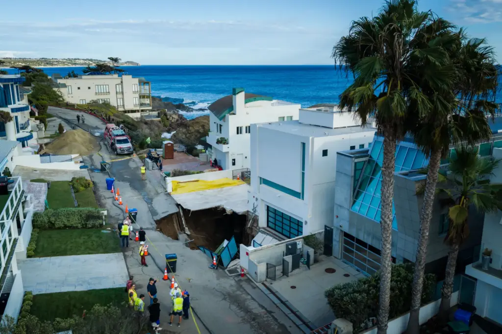 An aerial view of a sinkhole which collapsed the driveway...
