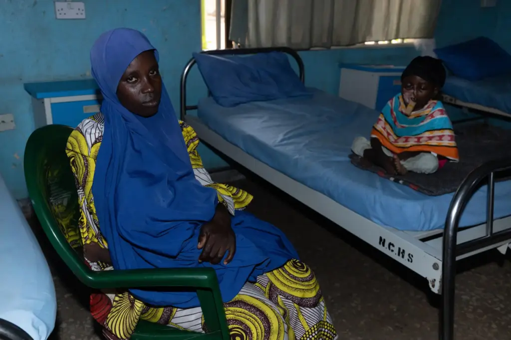 Hussaina Alhassan, right, who underwent facial reconstructive surgery to help...