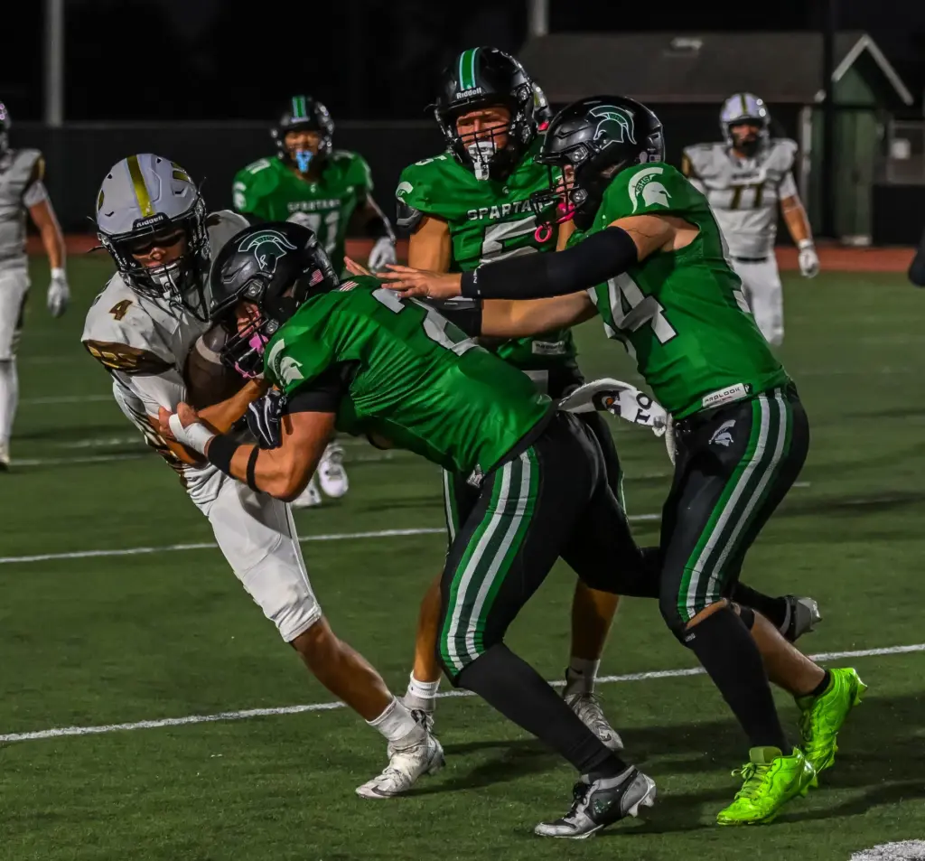 South Torrance’s defense brings down the opposing player during the...