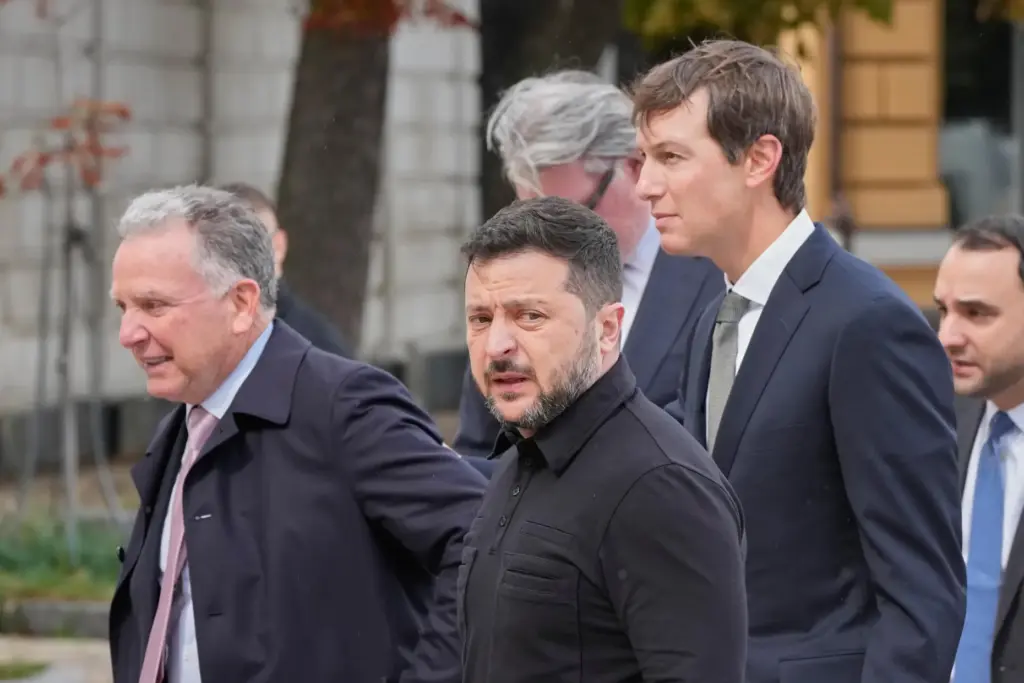 Ukraine’s President Volodymyr Zelenskyy, center, and U.S. President Donald Trump’s...