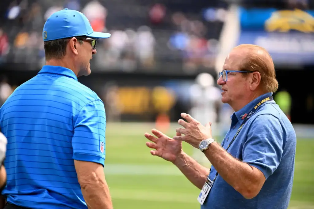 Chargers owner Dean Spanos, right, with head coach Jim Harbaugh...