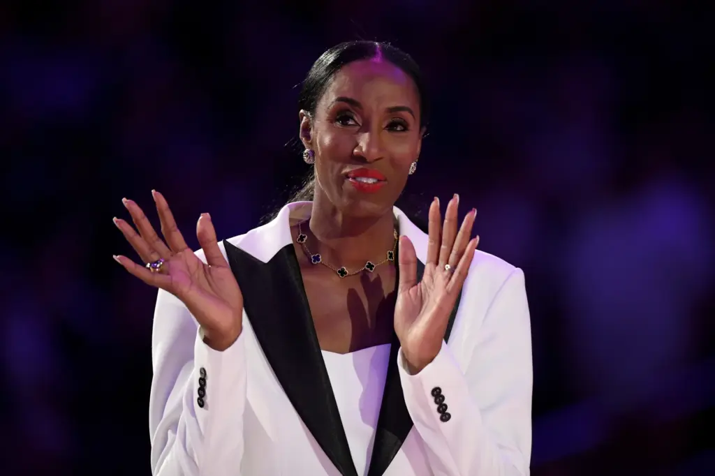 Lisa Leslie is honored at halftime during the game between...