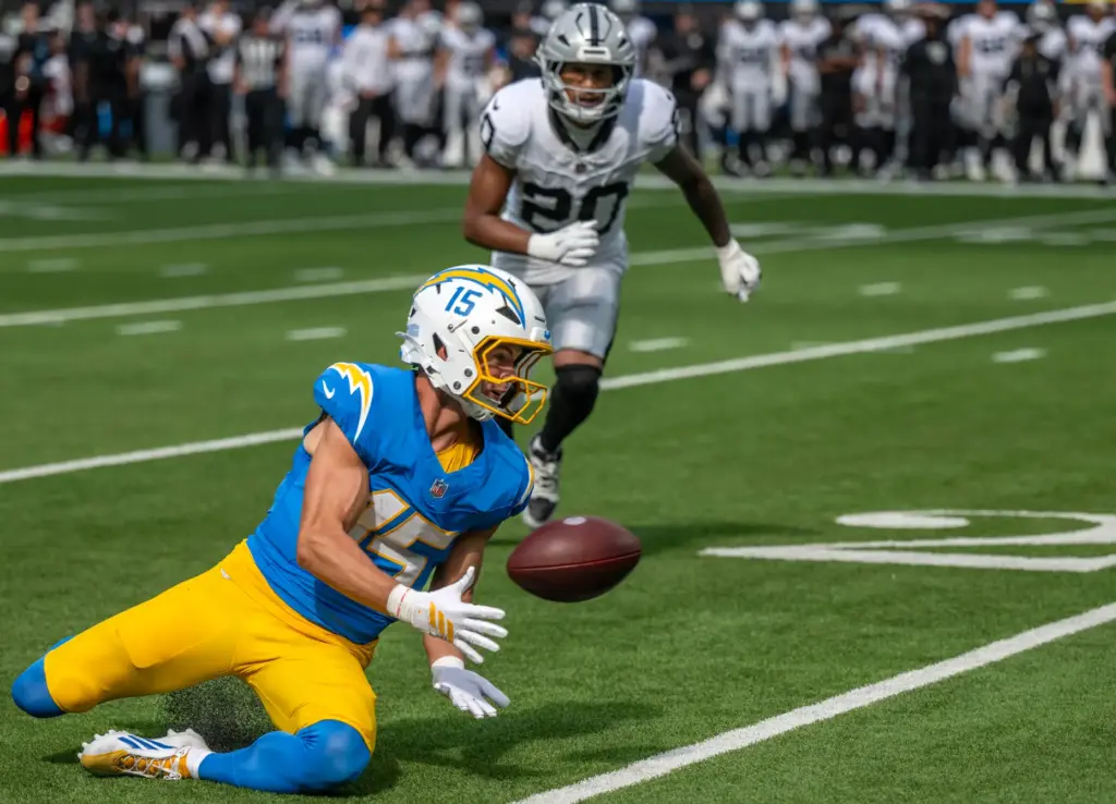 Chargers wide receiver Ladd McConkey (15) makes a sliding catch...