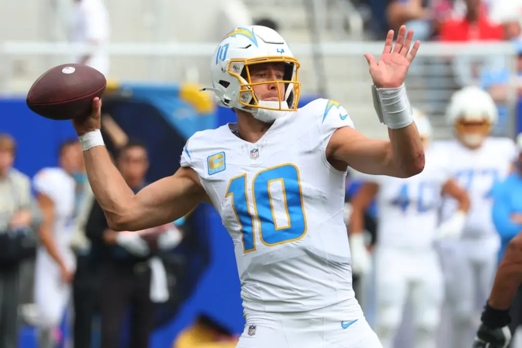 Chargers quarterback Justin Herbert (10) throws a pass during an...