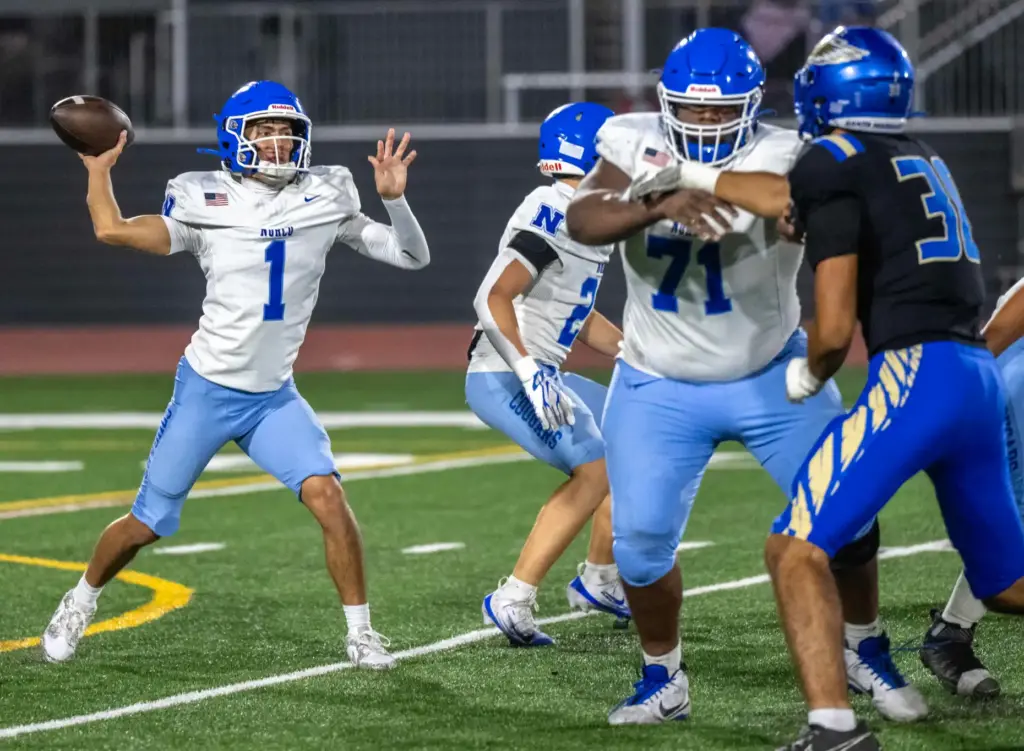 Norco quarterback Julian Medina (1) throws the ball during a...
