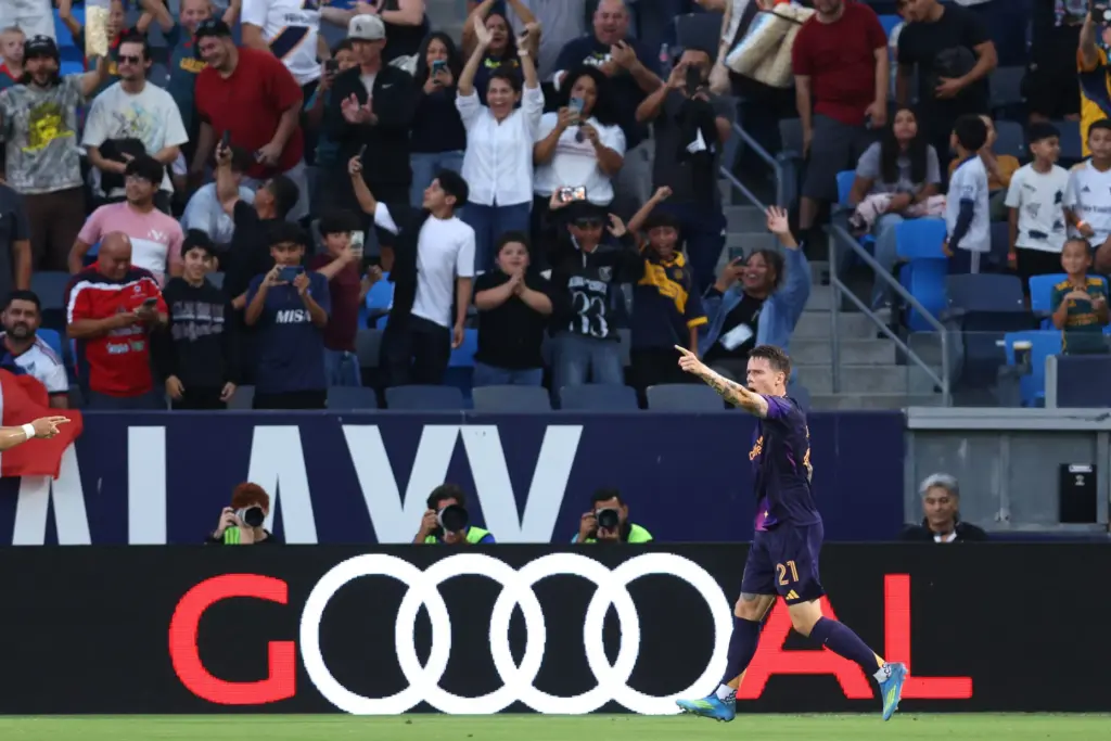 Galaxy forward Robert Taylor celebrates after scoring a goal against...