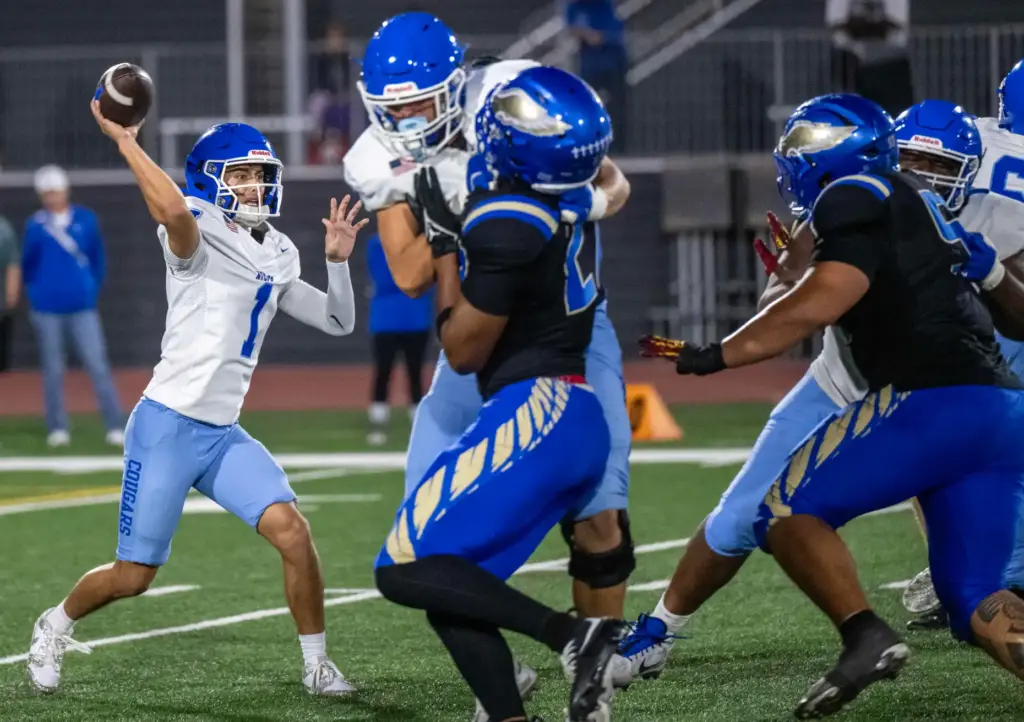 Norco quarterback Julian Medina (1) throws the ball during a...