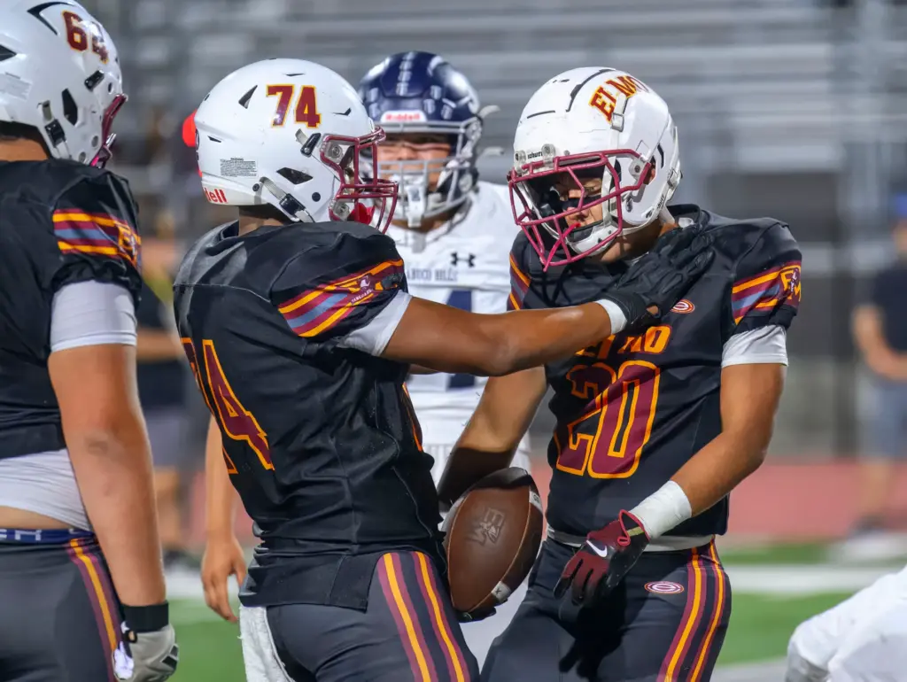 El Modena’s Nathan de la Vega, right, is congratulated by...