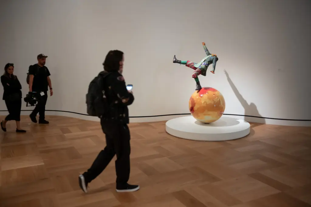 Visitors view âBoy on Globeâ by Yinka Shonibare at the...