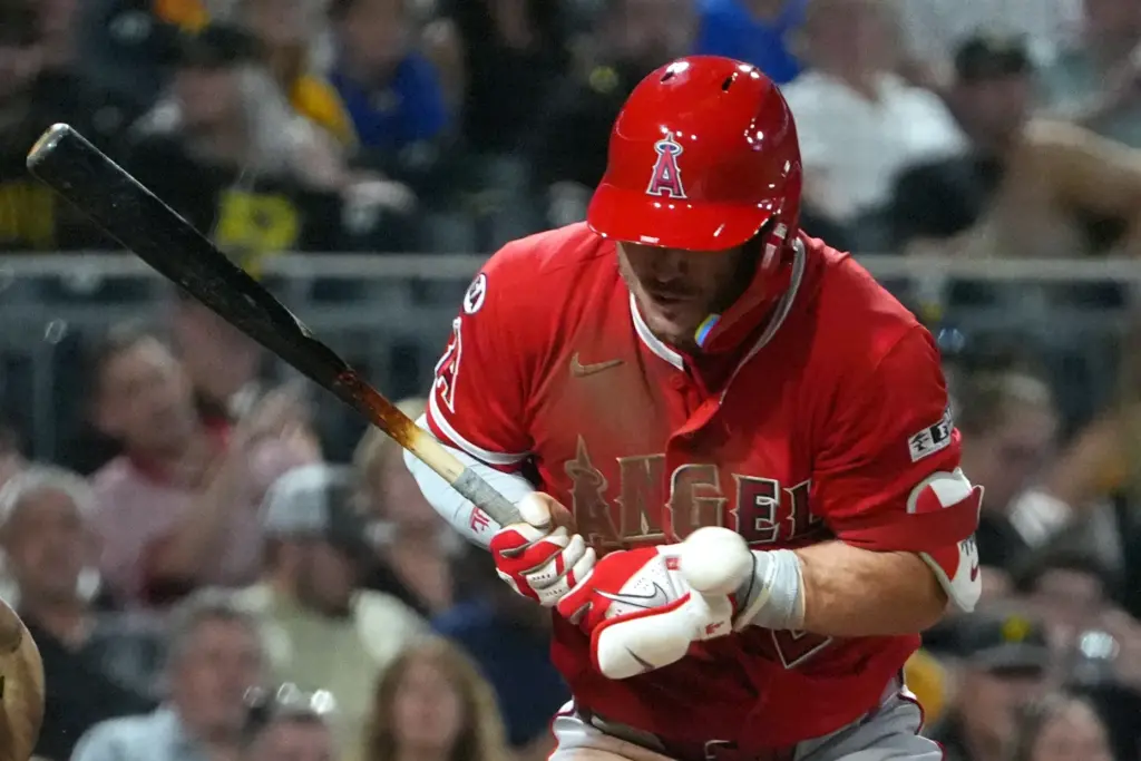 Angels’ Mike Trout is hit by a pitch from Pittsburgh...