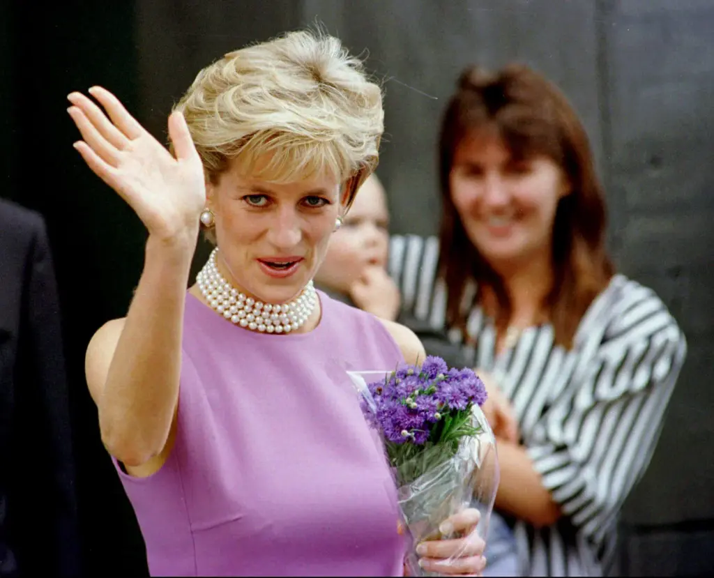 Diana, Princess of Wales waves to the crowd.