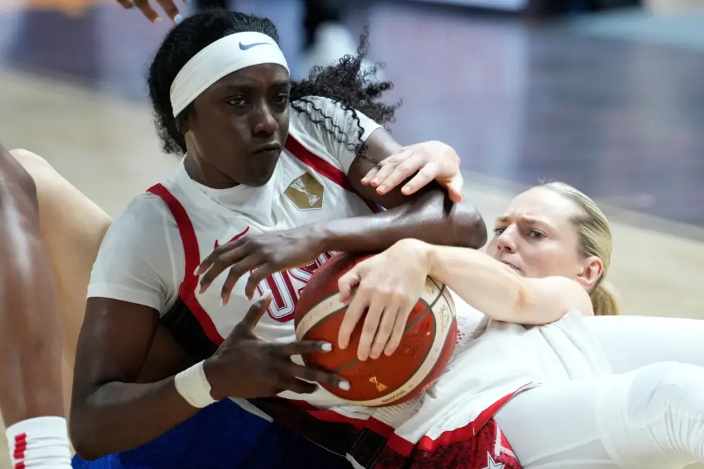 Team USA’s Kahleah Copper, left, and France’s Marine Johannes battle...