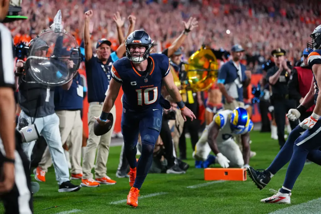 Denver Broncos quarterback Bo Nix reacts after a play against...
