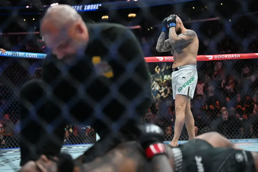 Sean Sharaf reacts after knocking out Gable Steveson in 12...