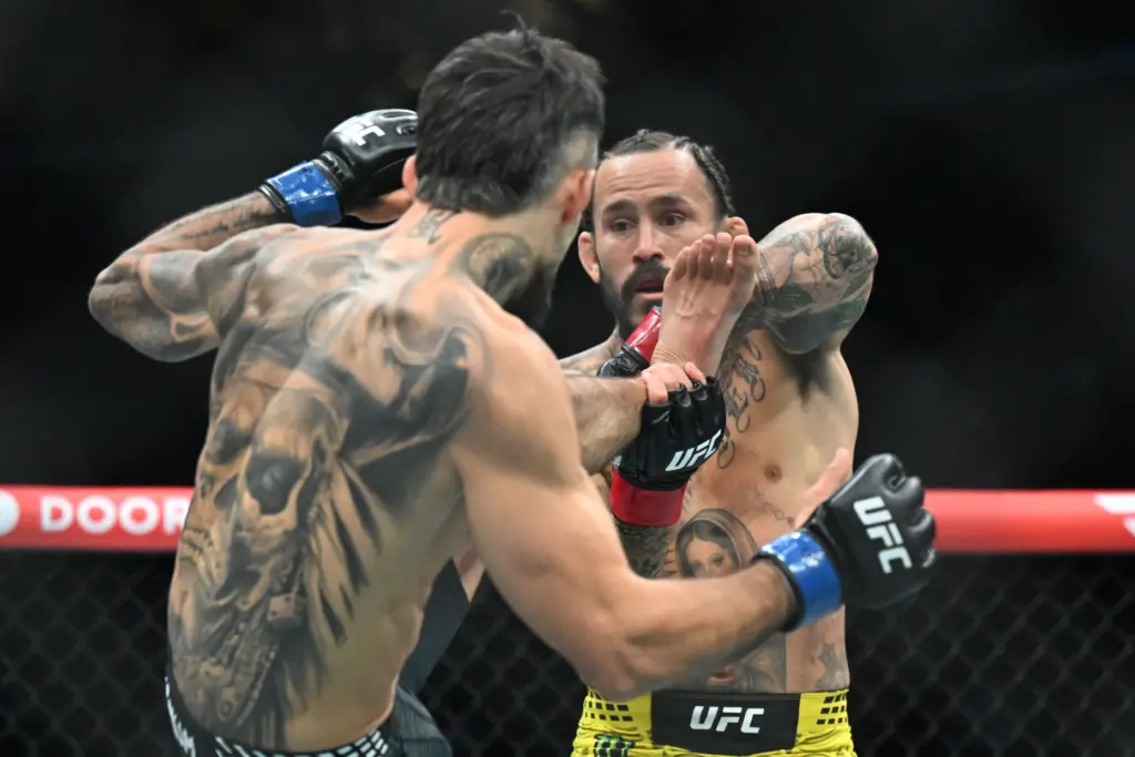 Marlon Vera (red) vs. Charles Jourdain (blue) during their fight...