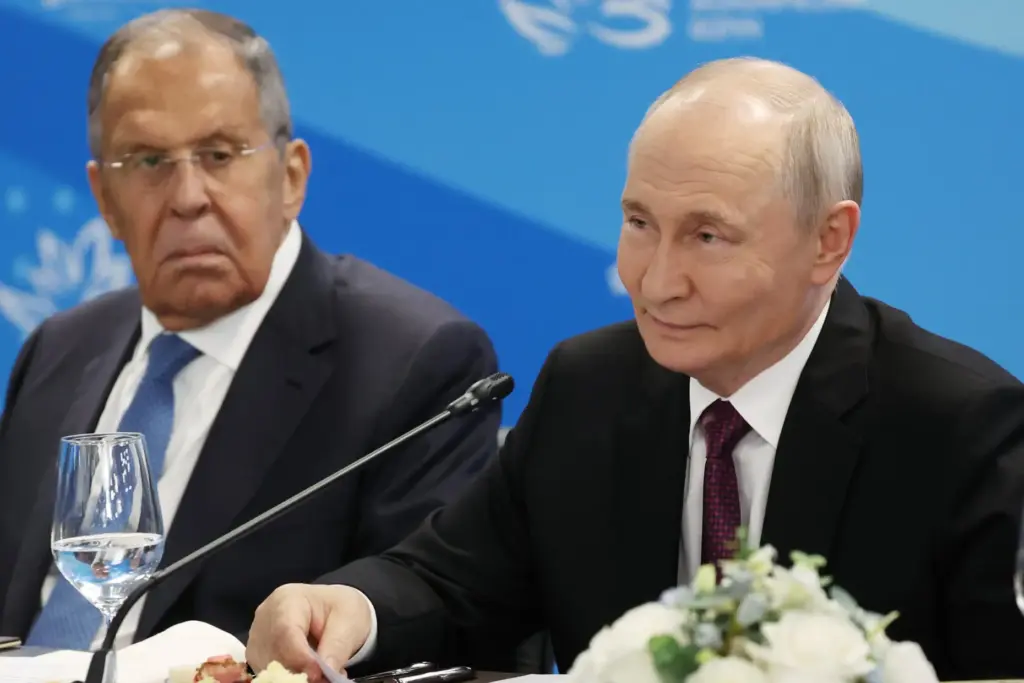 Russian President Vladimir Putin and Russian Foreign Minister Sergey Lavrov