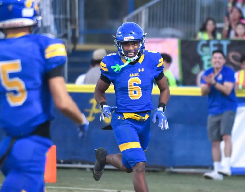 Bishop Amat running back Justin Clinton (6) celebrates scoring a...