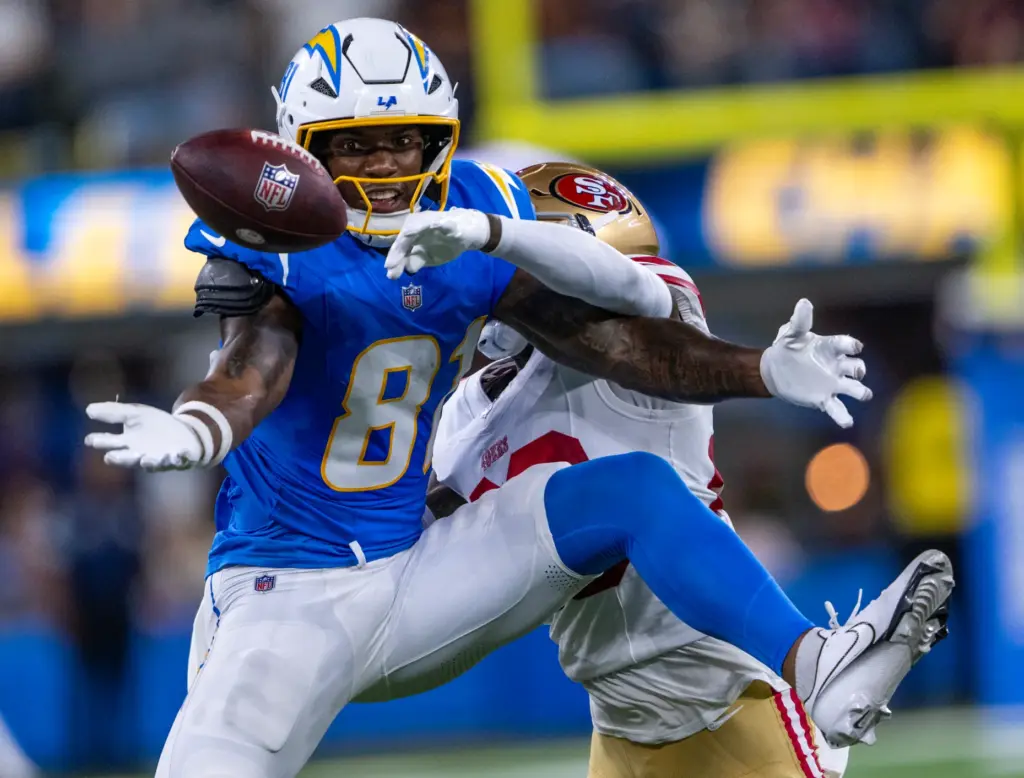 Los Angeles Chargers wide receiver Dalevon Campbell (81) tries to...