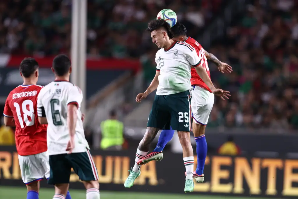 Mexico forward Roberto Alvarado (25) heads the ball during the...