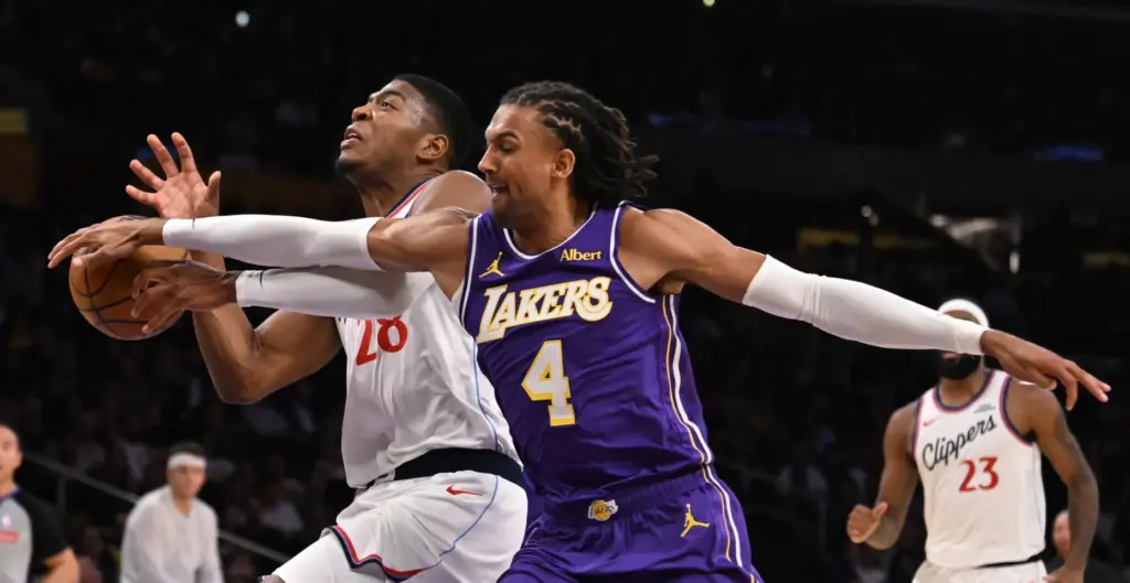 Lakers forward Matisse Thybulle steals the ball from Clippers forward...