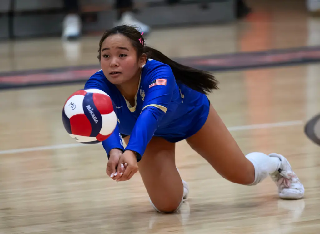 Santa Margarita’s KC Medina dives to get to a shot...