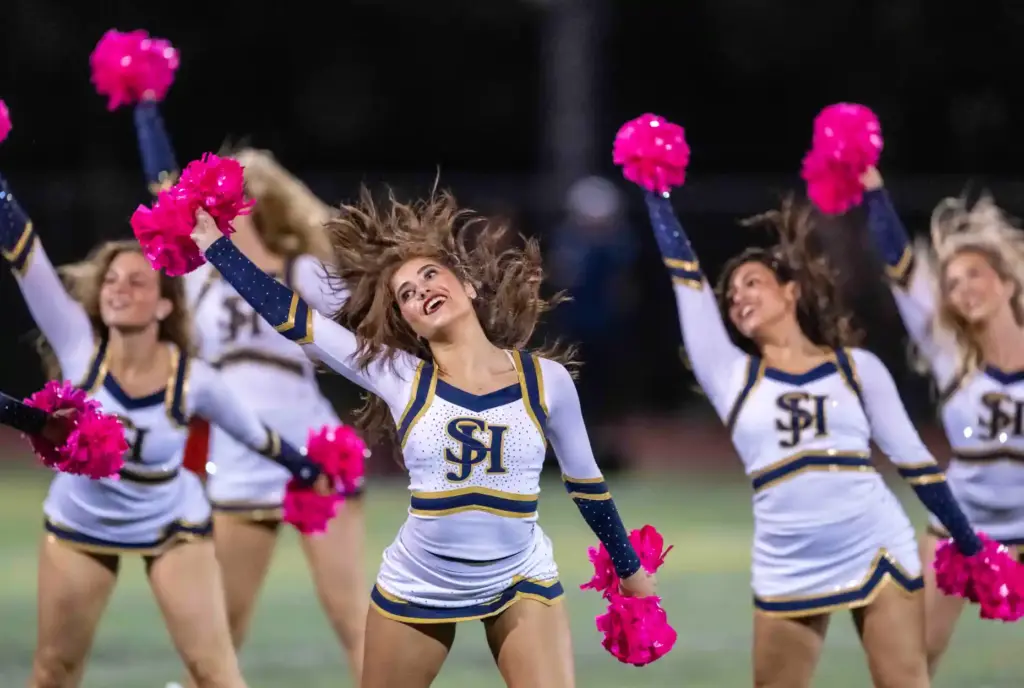 San Juan Hills cheerleaders perform on the field during halftime...