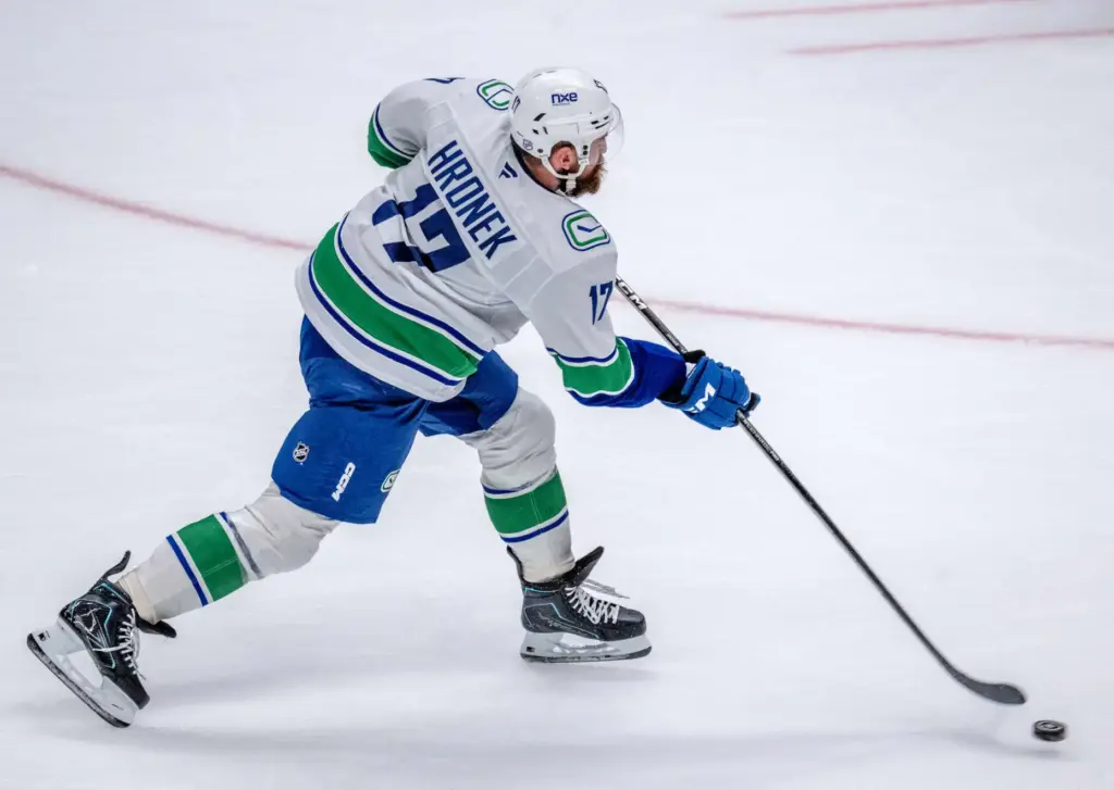 The Vancouver Canucksâ Filip Hronek shoots and scores the game-winning...
