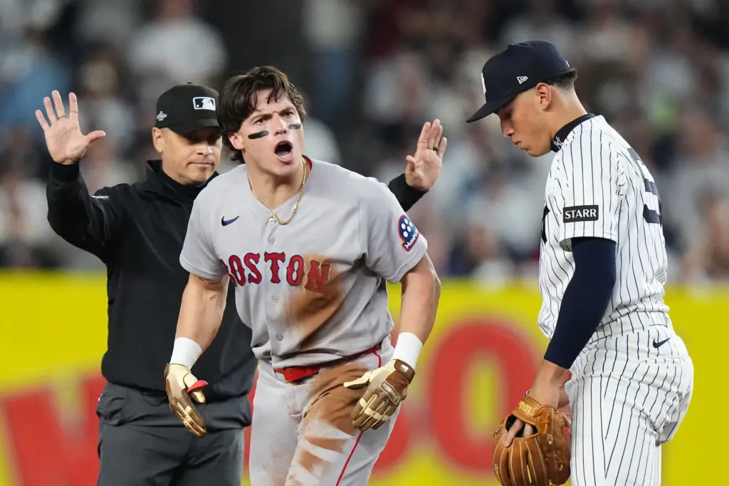 Boston Red Sox’s Nate Eaton celebrates hitting a double ahead...