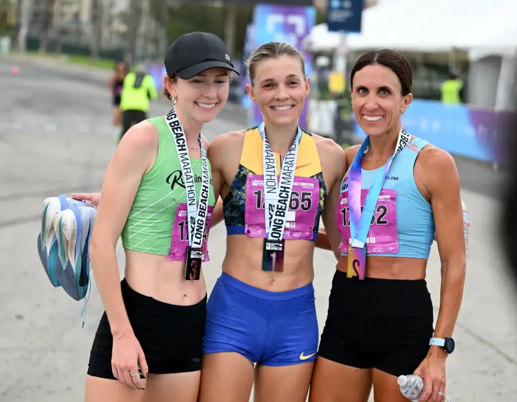 Bailey Hertenstein, center, wins the 2026 2XU Long Beach Half-Marathon...