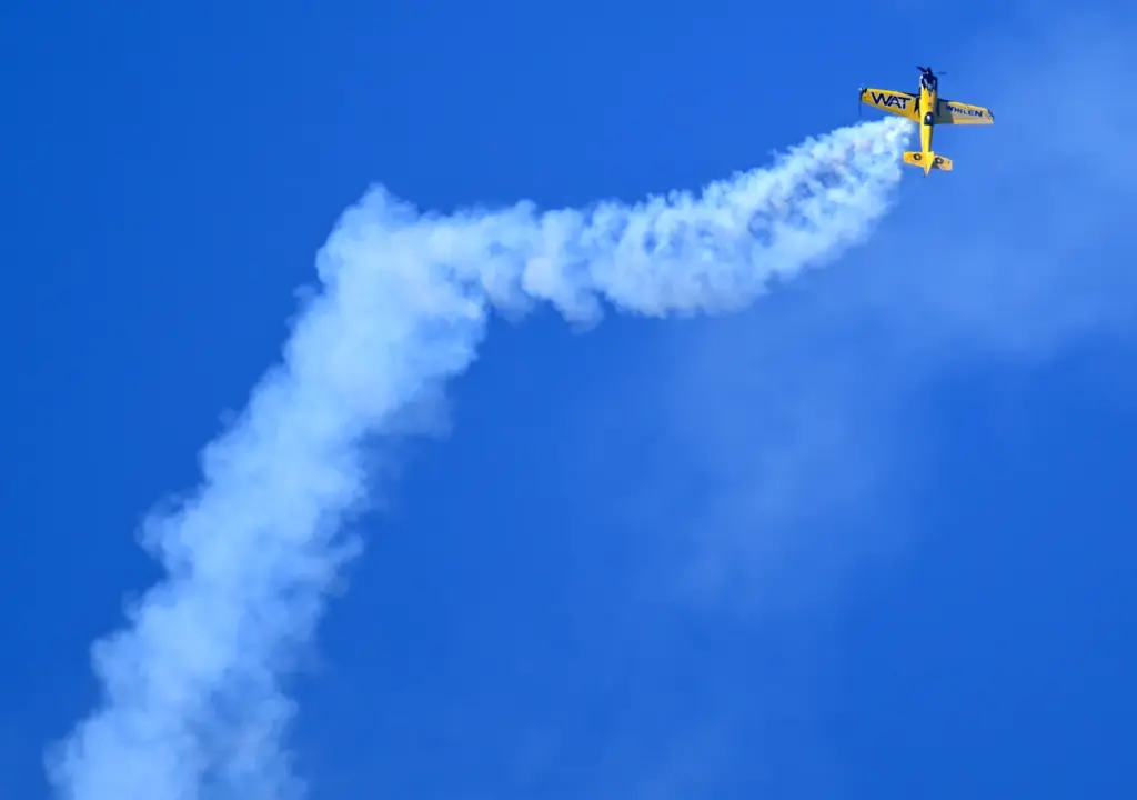 Mike Goulian, flying his Extra 330SC, performs during the Pacific...
