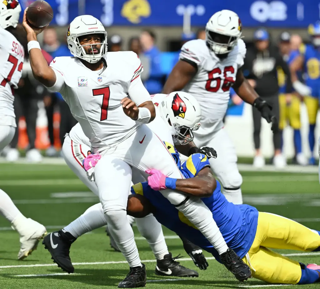 Rams linebacker Byron Young (0) pressures Arizona Cardinals quarterback Jacoby...